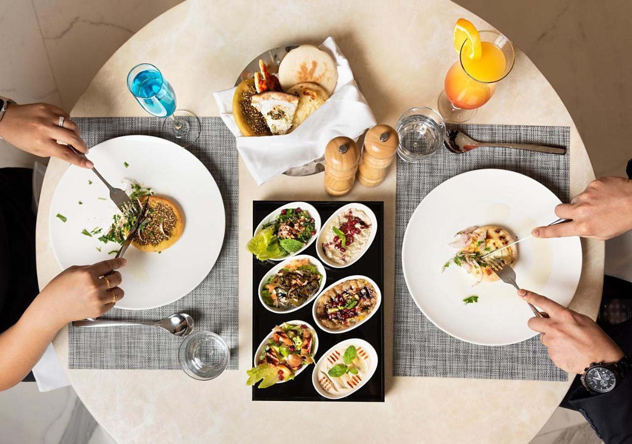 Asiana Grand Hotel دبي المظهر الخارجي الصورة A selection of meze